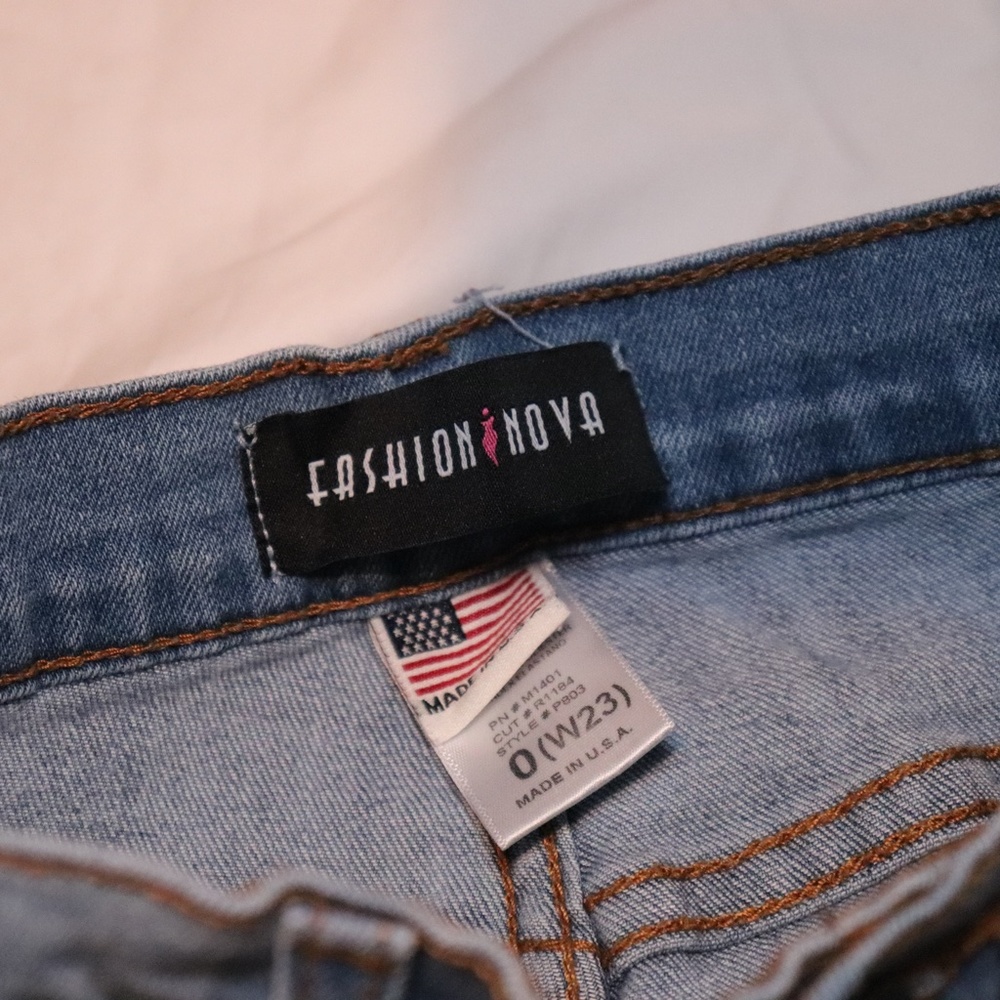 Light Wash Ripped Jeans - Picture 4 of 6